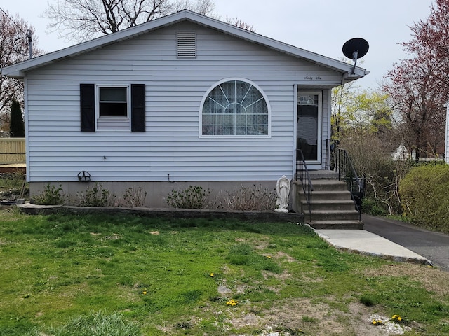 66 Macnamara St, Waterbury, CT 06708 - view of front facade with a front yard