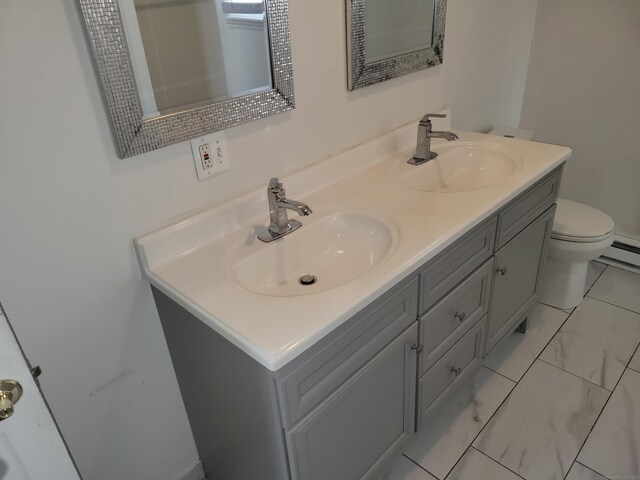 66 Macnamara St, Waterbury, CT 06708 - bathroom featuring double vanity and toilet
