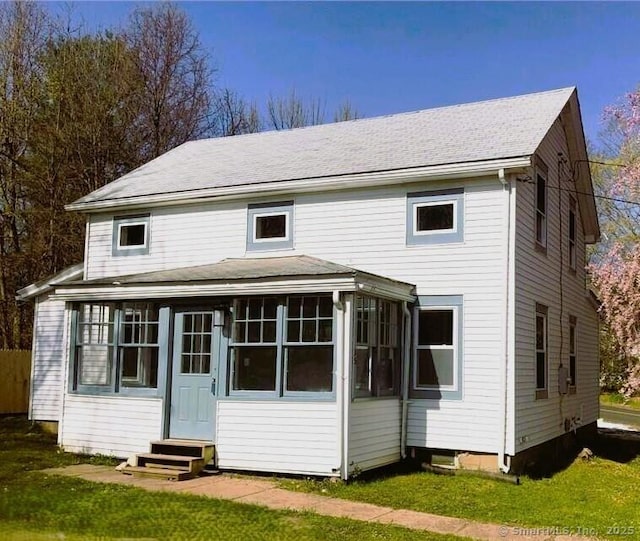 35 Church St, East Windsor, CT 06016 - rear view of house with entry steps, a sunroom, a shingled roof, and a yard