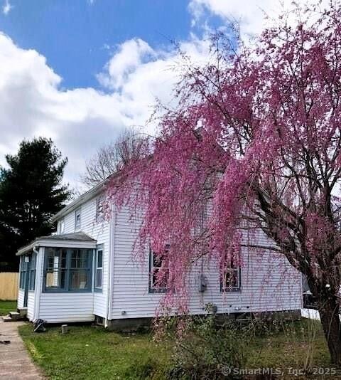 35 Church St, East Windsor, CT 06016 - view of side of property featuring a sunroom