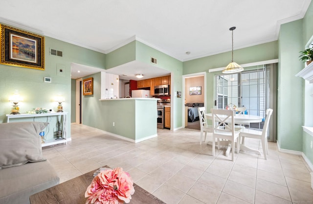 31 High St Unit 10103, East Hartford, CT 06118 - dining room with light tile patterned floors, crown molding, and baseboards