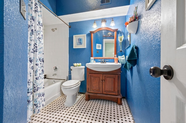 31 High St Unit 10103, East Hartford, CT 06118 - full bathroom featuring a textured wall, shower / bathtub combination with curtain, vanity, toilet, and tile patterned floors