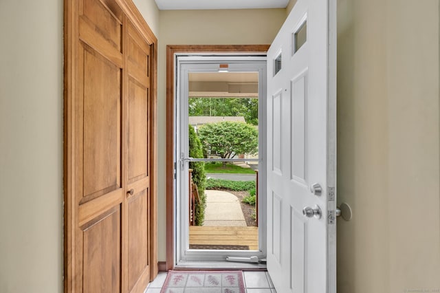 472 Carriage Dr Unit 472, Southington, CT 06489 - doorway to outside with light tile patterned flooring
