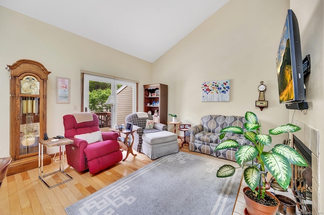 472 Carriage Dr Unit 472, Southington, CT 06489 - living room featuring hardwood / wood-style flooring and high vaulted ceiling