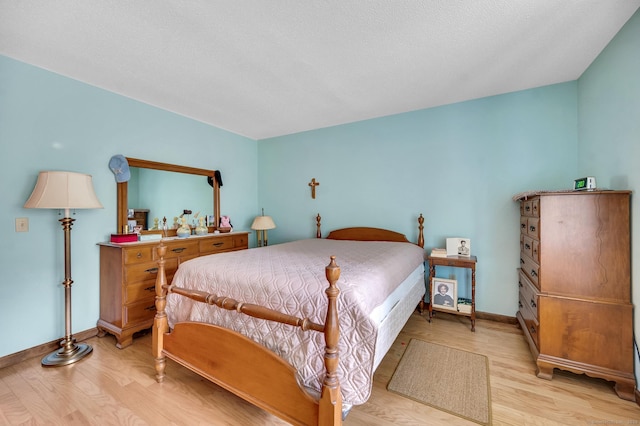 472 Carriage Dr Unit 472, Southington, CT 06489 - bedroom with light wood finished floors and baseboards
