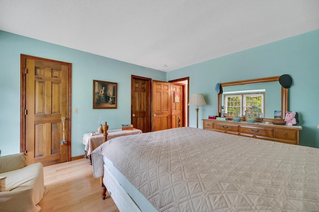 472 Carriage Dr Unit 472, Southington, CT 06489 - bedroom with light wood-style floors
