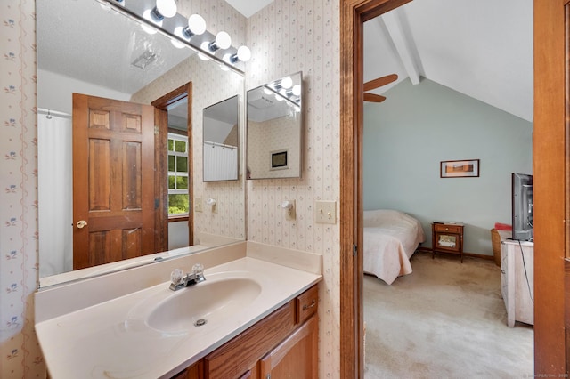 472 Carriage Dr Unit 472, Southington, CT 06489 - ensuite bathroom featuring vanity, wallpapered walls, and baseboards