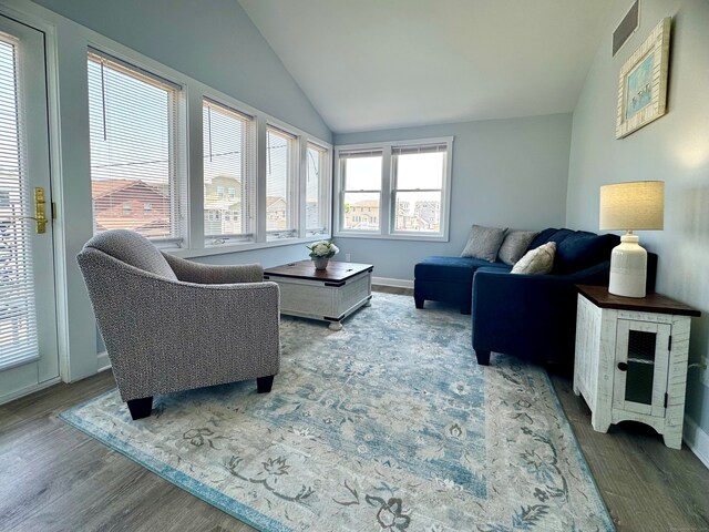 25 Milesfield Ave, Milford, CT 06460 - living area with vaulted ceiling and wood finished floors