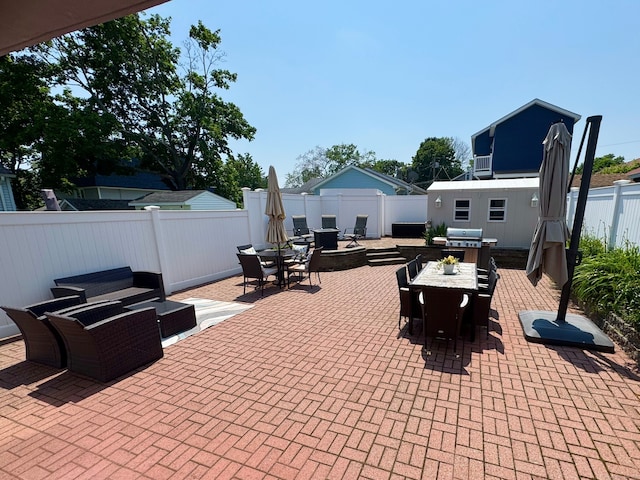 25 Milesfield Ave, Milford, CT 06460 - fenced backyard featuring outdoor dining area, a patio area, and an outdoor living space with a fire pit