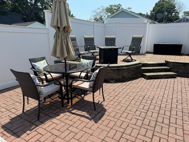 25 Milesfield Ave, Milford, CT 06460 - view of patio featuring a fire pit and outdoor dining space