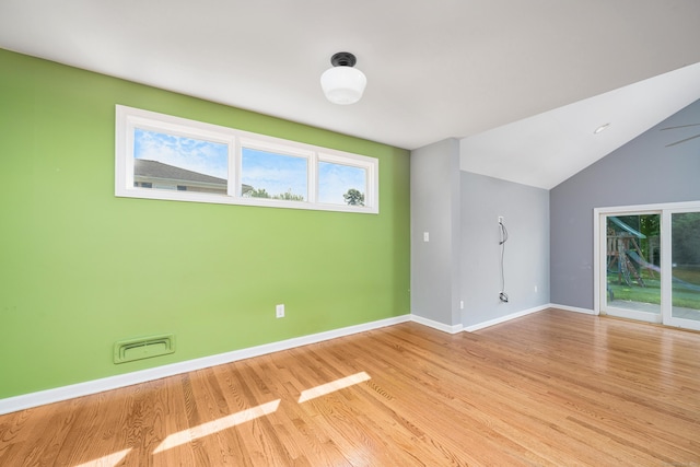 34 Fox Hill Rd, Wethersfield, CT 06109 - spare room featuring plenty of natural light, baseboards, light wood-style flooring, and vaulted ceiling