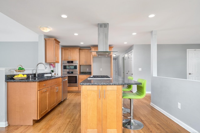 34 Fox Hill Rd, Wethersfield, CT 06109 - kitchen with island exhaust hood, appliances with stainless steel finishes, dark stone countertops, a kitchen bar, and recessed lighting