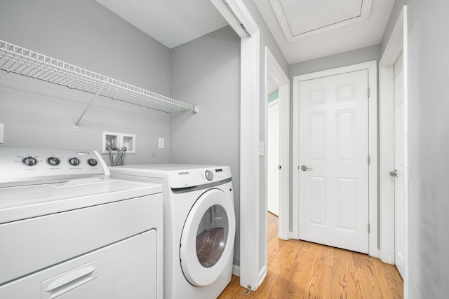 34 Fox Hill Rd, Wethersfield, CT 06109 - washroom with washer and clothes dryer and light wood-style floors