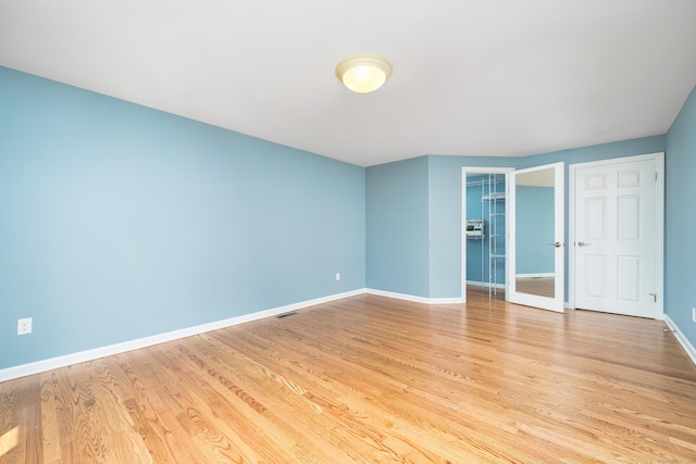 34 Fox Hill Rd, Wethersfield, CT 06109 - unfurnished bedroom with baseboards, light wood finished floors, and a closet