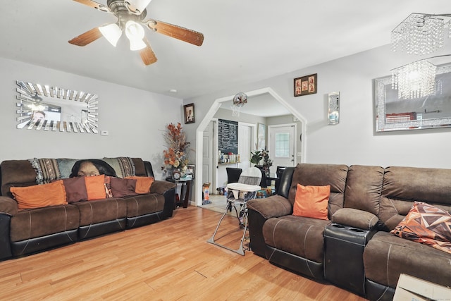 241 Wallace St, New Haven, CT 06511 - living room featuring wood finished floors, ceiling fan, and a chandelier