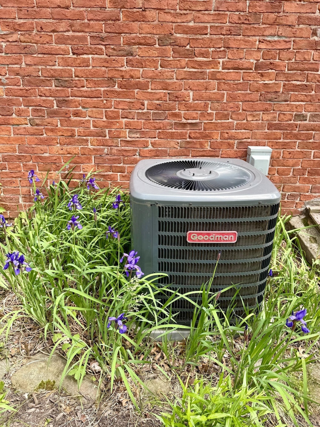 517 Wolcott Hill Rd, Wethersfield, CT 06109 - exterior view of cooling unit and brick siding