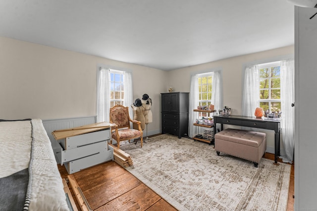 517 Wolcott Hill Rd, Wethersfield, CT 06109 - bedroom featuring hardwood / wood-style floors and wainscoting
