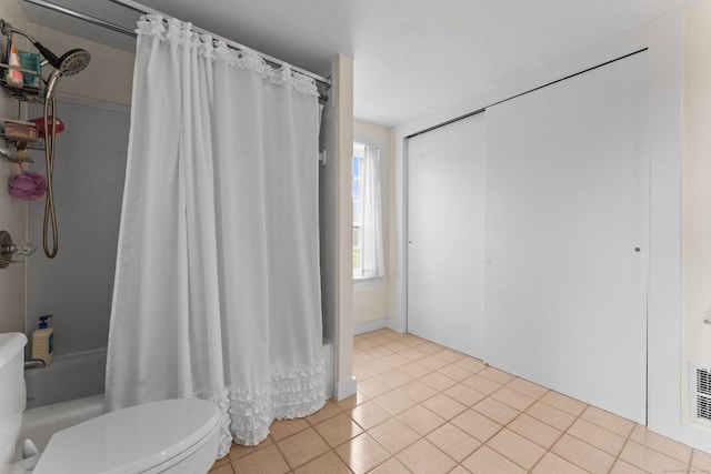 517 Wolcott Hill Rd, Wethersfield, CT 06109 - bathroom with shower / bathtub combination with curtain, toilet, and tile patterned flooring