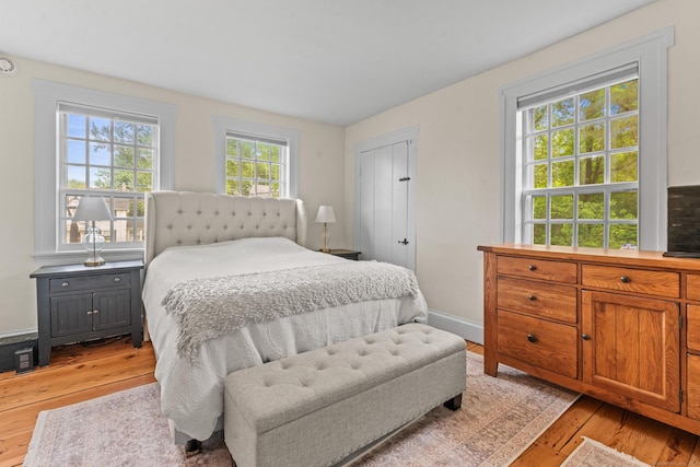 517 Wolcott Hill Rd, Wethersfield, CT 06109 - bedroom featuring light wood finished floors and baseboards