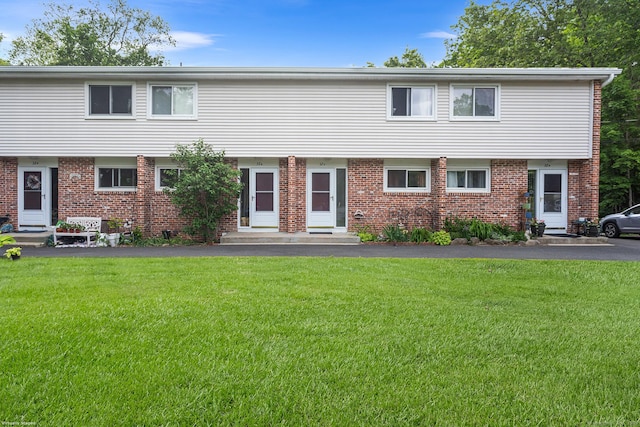 32 Anton Rd Apt C, Mansfield, CT 06268 - view of front facade featuring brick siding, a front lawn, and entry steps