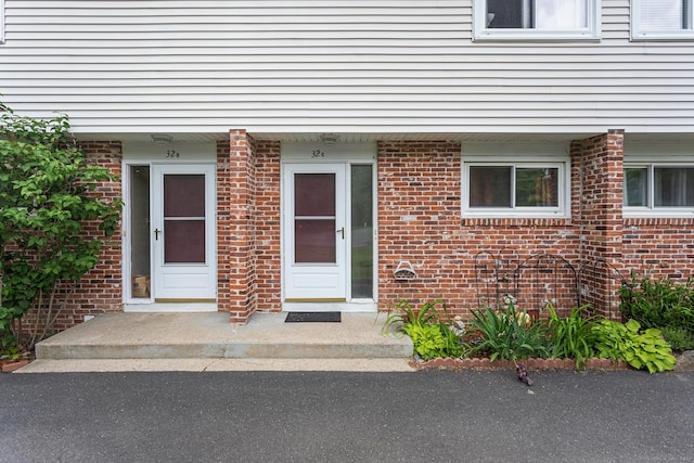 32 Anton Rd Apt C, Mansfield, CT 06268 - doorway to property with brick siding