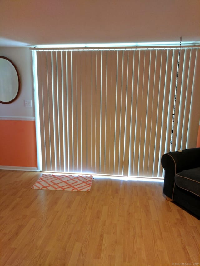 32 Anton Rd Apt C, Mansfield, CT 06268 - empty room with wood finished floors and baseboards