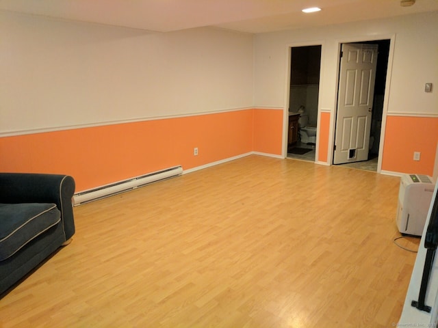 32 Anton Rd Apt C, Mansfield, CT 06268 - living area with a baseboard radiator, wood finished floors, and recessed lighting