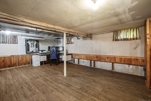 104 Bay Ave, New Britain, CT 06053 - finished basement with wood finished floors, an office area, and wainscoting