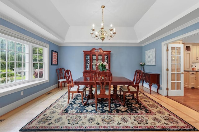 16 Oak Blf, Avon, CT 06001 - dining room featuring a raised ceiling, a chandelier, and light wood finished floors