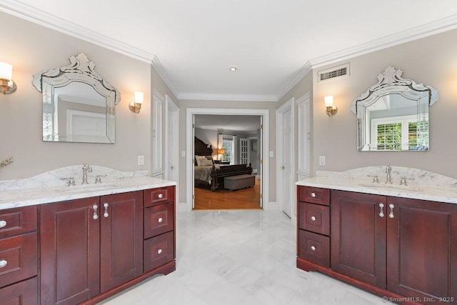 16 Oak Blf, Avon, CT 06001 - full bath with two vanities, connected bathroom, crown molding, and marble look tile flooring