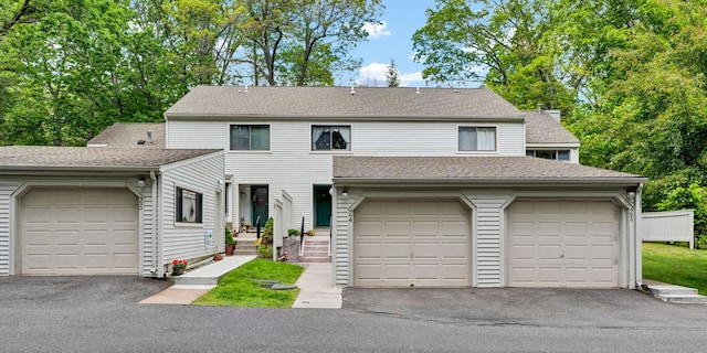24 Farmington Chase Cres, Farmington, CT 06032 - view of property featuring roof with shingles