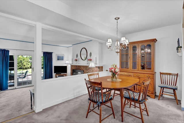 24 Farmington Chase Cres, Farmington, CT 06032 - dining space with carpet floors, a chandelier, and a brick fireplace