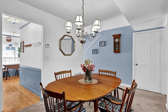 24 Farmington Chase Cres, Farmington, CT 06032 - dining room with a chandelier, a wainscoted wall, and light wood-style floors