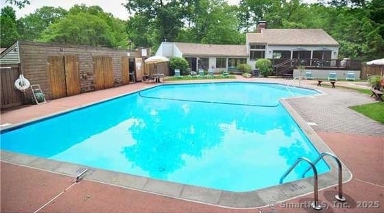 24 Farmington Chase Cres, Farmington, CT 06032 - view of pool featuring view of wooded area