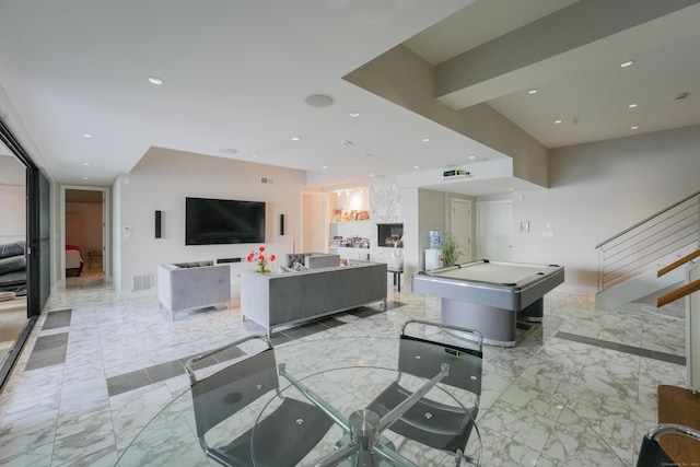 5050 Main St, Stratford, CT 06614 - living area with light marble finish flooring, recessed lighting, stairs, and billiards