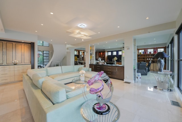 5050 Main St, Stratford, CT 06614 - living room featuring stairs, recessed lighting, and light tile patterned floors
