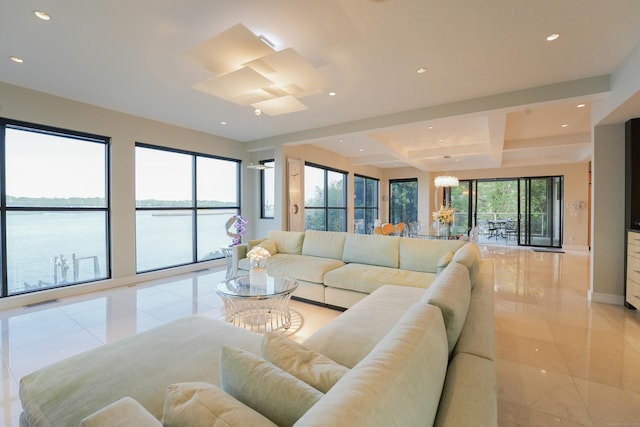 5050 Main St, Stratford, CT 06614 - living area with recessed lighting, baseboards, coffered ceiling, and a water view