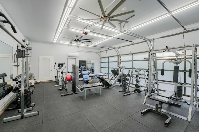 5050 Main St, Stratford, CT 06614 - exercise room featuring ceiling fan and a garage