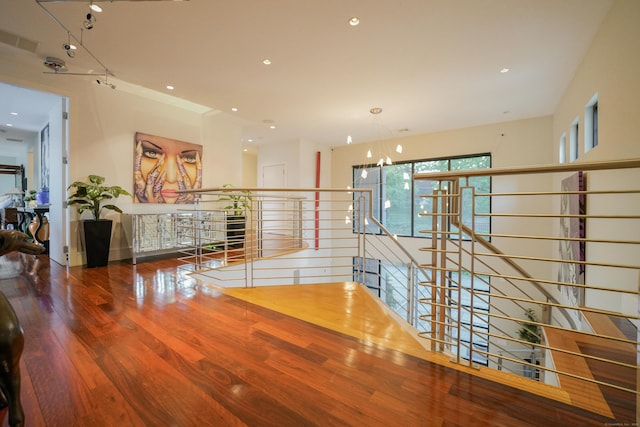 5050 Main St, Stratford, CT 06614 - hall featuring an upstairs landing, wood finished floors, a chandelier, and recessed lighting