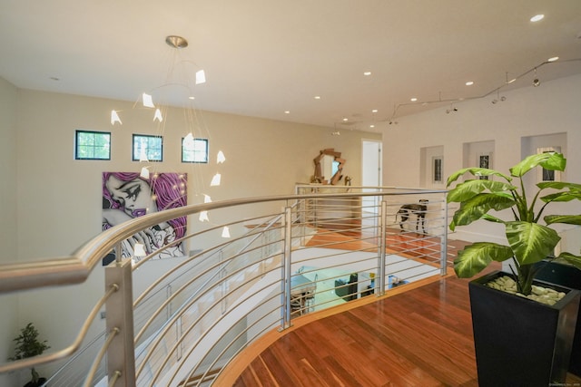5050 Main St, Stratford, CT 06614 - stairway featuring wood finished floors and recessed lighting