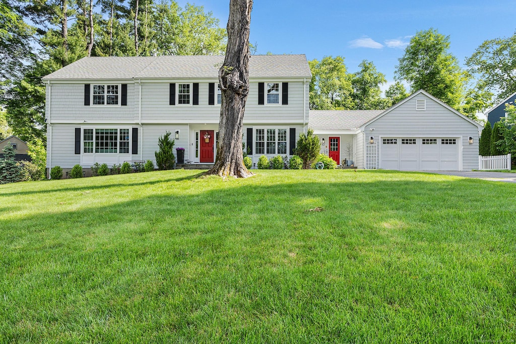 82 High Wood Rd, West Hartford, CT 06117 - colonial inspired home with a garage, a front lawn, and driveway