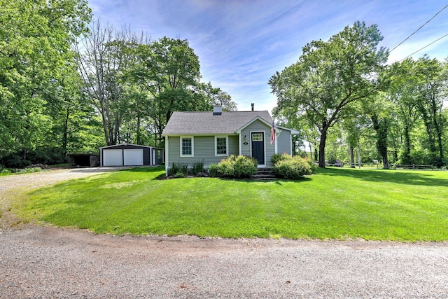 10 Sunset Trl, Coventry, CT 06238 - bungalow-style home with an outdoor structure, a detached garage, a chimney, and a front yard