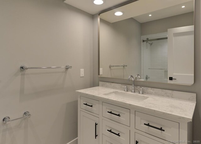 143 Heritage Vlg Unit E, Southbury, CT 06488 - full bath featuring vanity, recessed lighting, and a shower