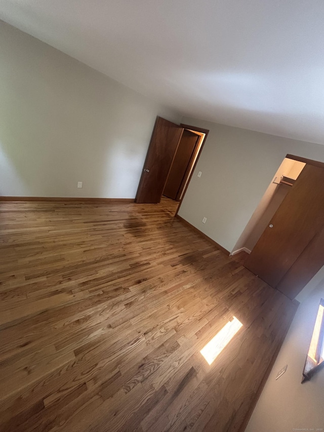 33 Hillsdale Dr, Ellington, CT 06029 - empty room featuring wood finished floors and baseboards