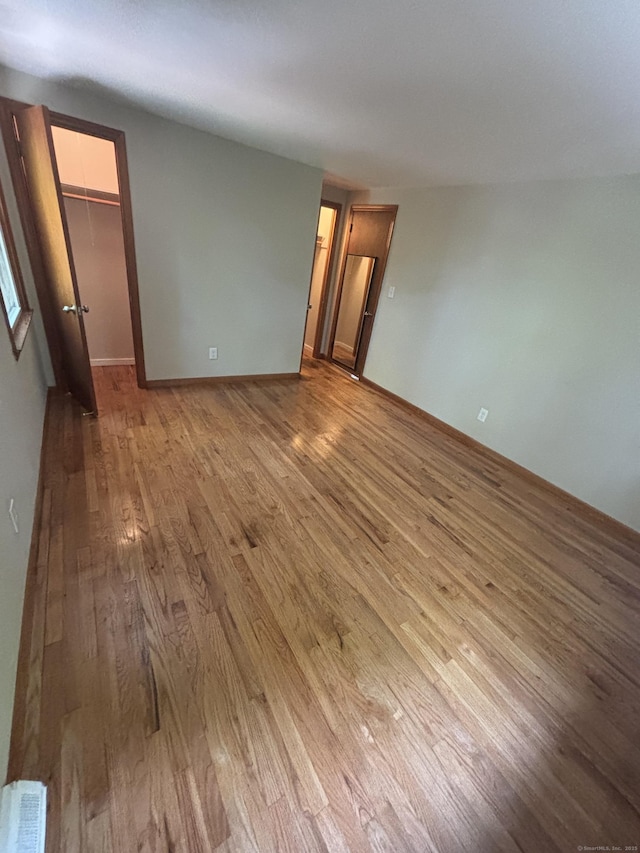 33 Hillsdale Dr, Ellington, CT 06029 - empty room with wood finished floors and baseboards