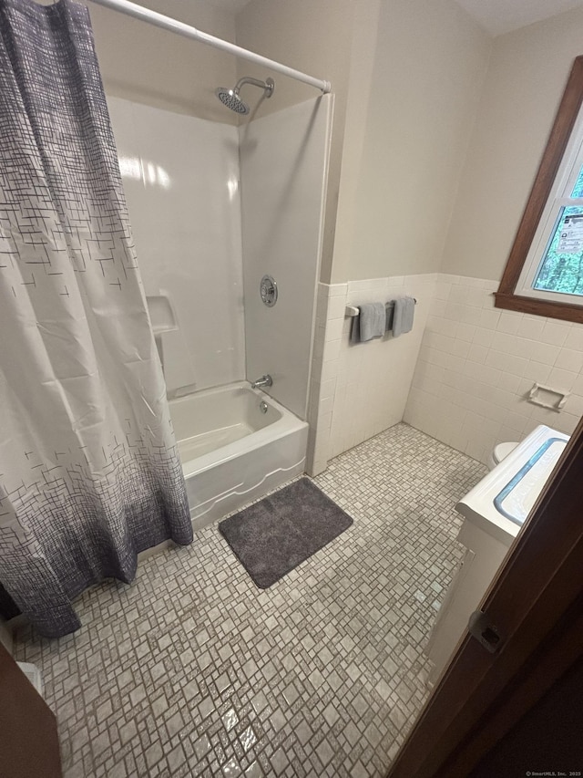 33 Hillsdale Dr, Ellington, CT 06029 - full bath with shower / bath combo with shower curtain, a wainscoted wall, vanity, and tile walls