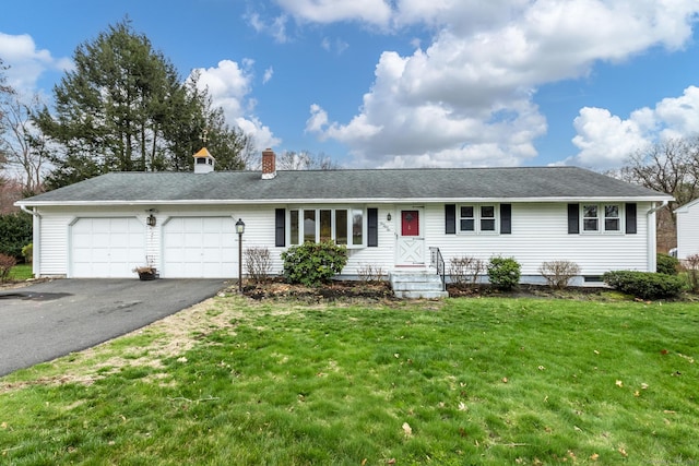 192 Hilton Dr, South Windsor, CT 06074 - ranch-style house featuring asphalt driveway, an attached garage, a chimney, and a front yard
