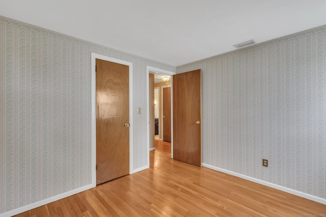 192 Hilton Dr, South Windsor, CT 06074 - empty room with wood finished floors and baseboards