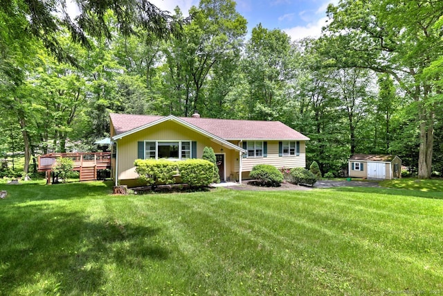 9 Honey Ln, Newtown, CT 06482 - view of front of home featuring a deck, a front yard, and roof with shingles