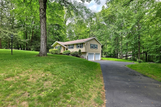 9 Honey Ln, Newtown, CT 06482 - view of front of property featuring an attached garage, driveway, and a front lawn